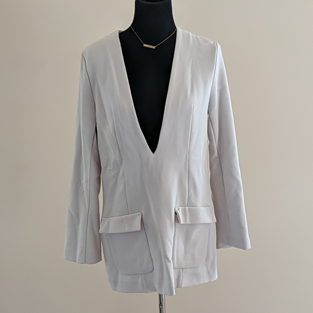 Cream tunic with pockets